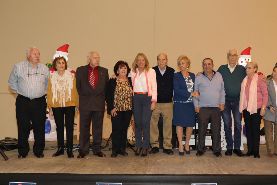La alcaldesa asiste a la Merienda de Navidad de los Centros de Participación Activa en el Palacio de Congresos Adolfo Suárez